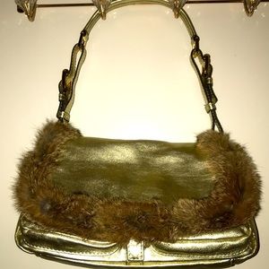 Gold leather handbag